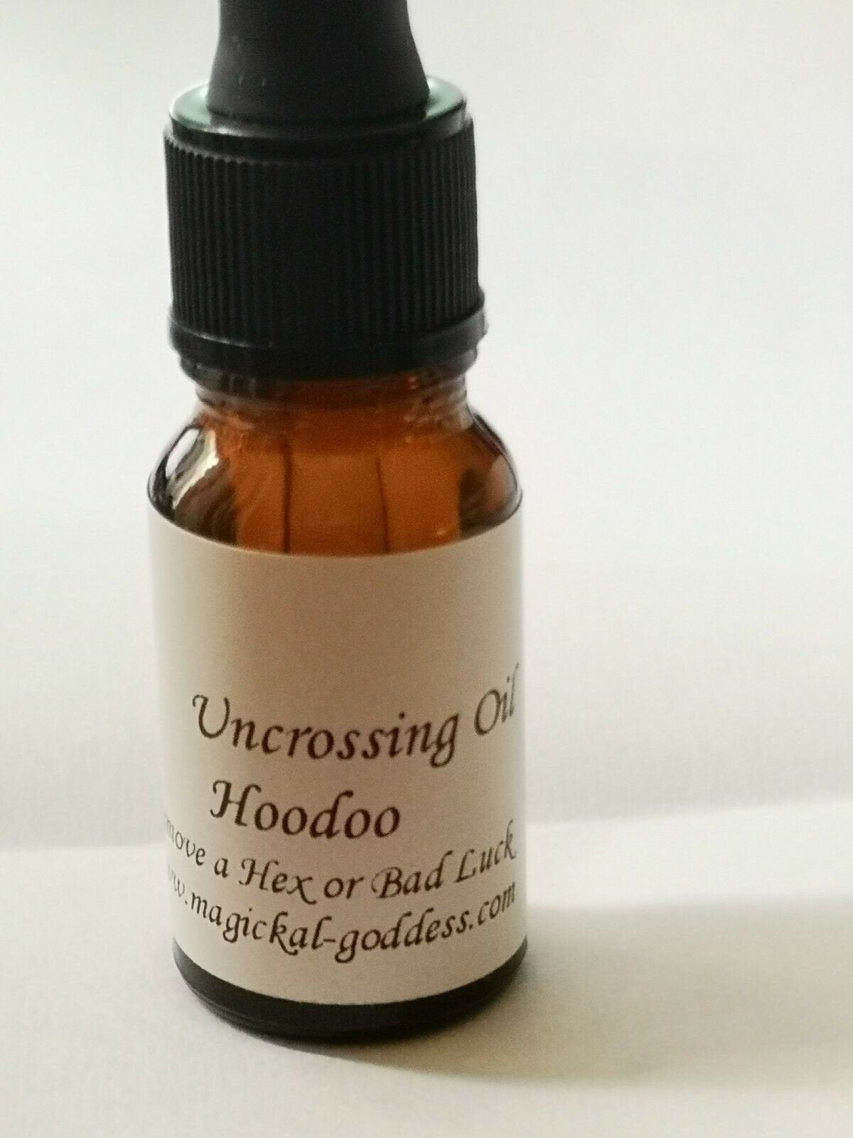 Uncrossing Magickal Oil - Hoodoo - Wiccan - Magick - With Herbs and Roots