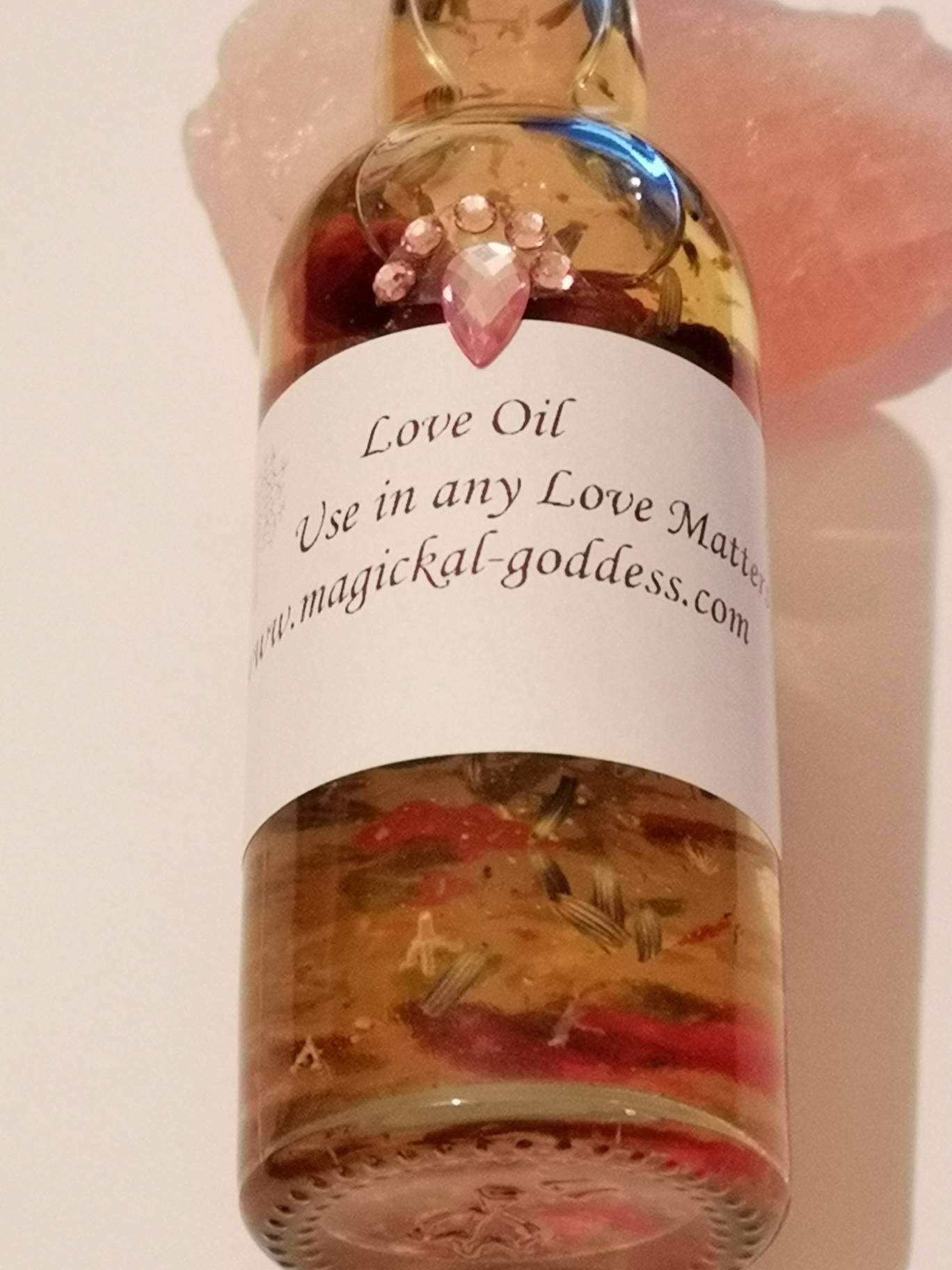 Kissys Love Magickal Oil - Hoodoo - Wiccan - Magick - With Herbs and Roots. Draws Love and Romance to you. 50ml- Bigger Bottle