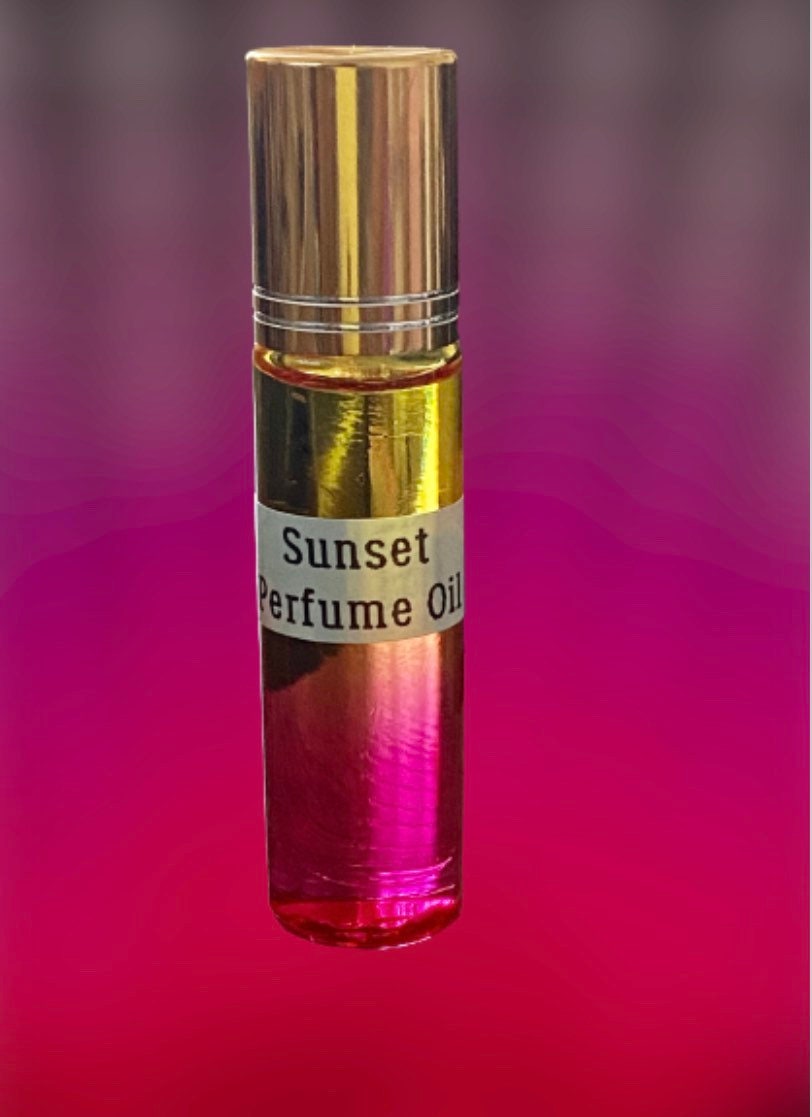 Sunset Mesmerising roll on perfume in a 10ml bottle. Gift, Beautiful Coconut, Musk, Apple, Gardenia, Sweet Orange Scent, Ladies, Men.