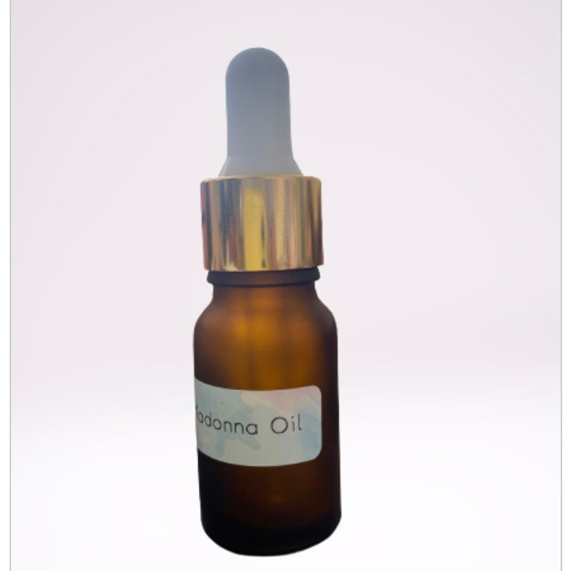 Black Madonna Hoodoo Oil 10ml Dropper Bottle. Magick Perfume Oil, Herbal Oil 10ml Bottle. - With Herbs and Roots. Love Oil, Essential oil
