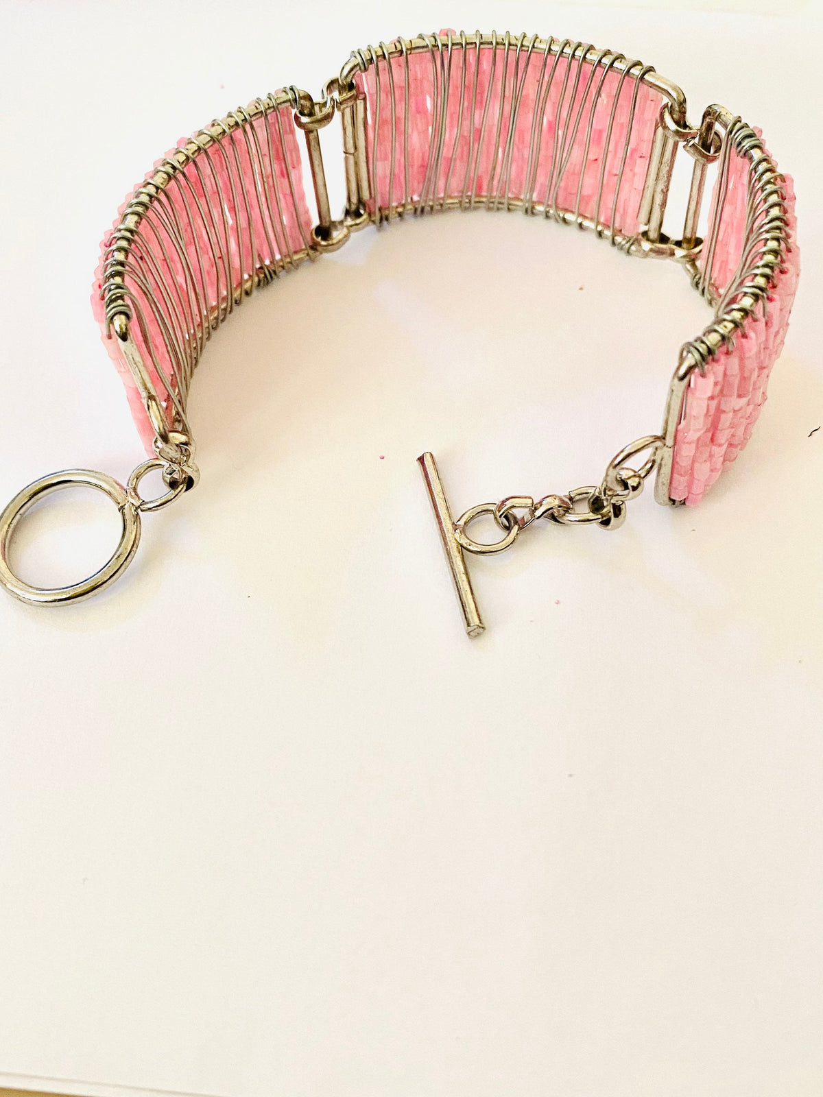 Ladies, Women’s, Girls Pink Breaded Movable Pieces Charm Silver toned Bracelet.