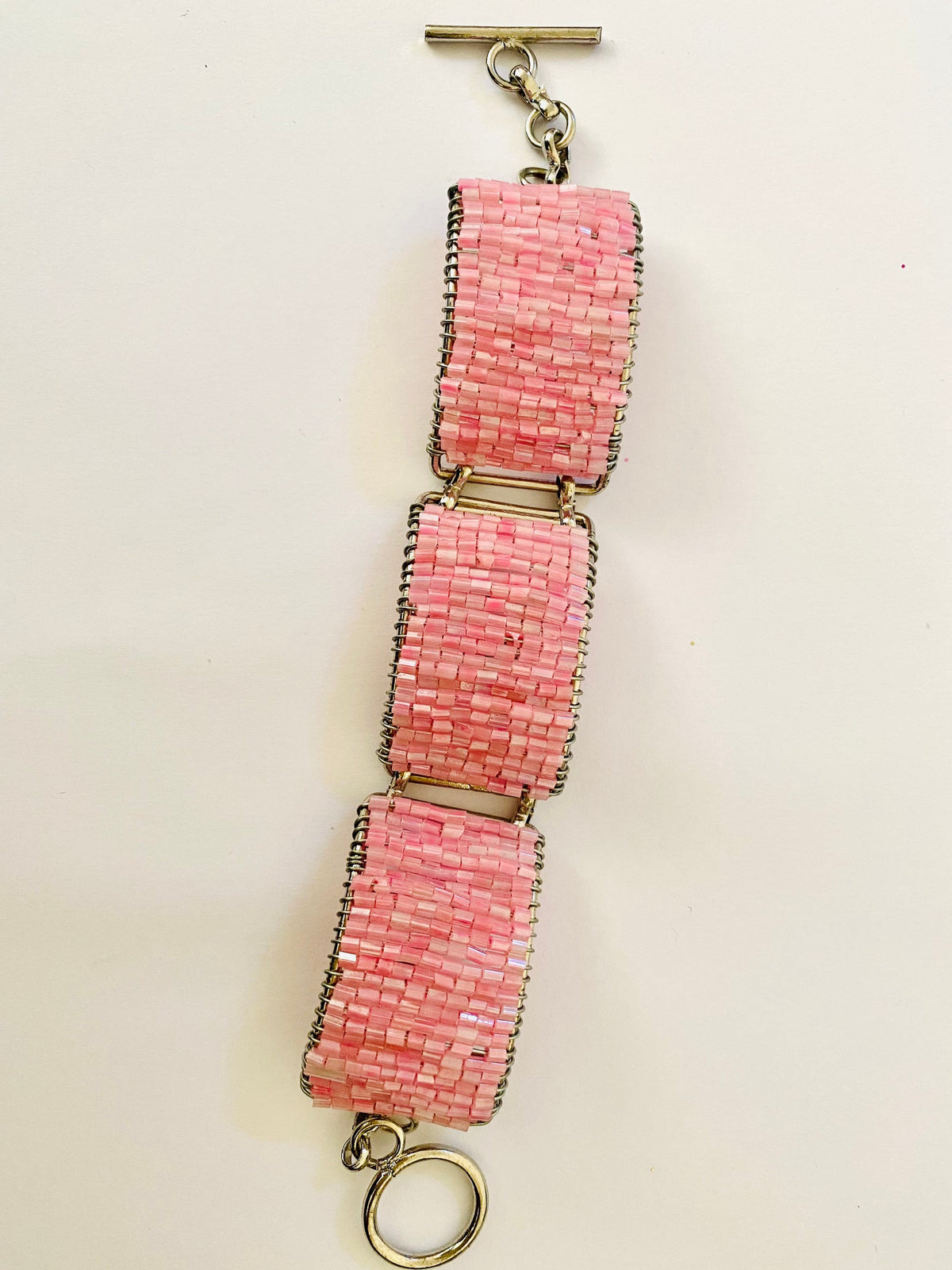 Ladies, Women’s, Girls Pink Breaded Movable Pieces Charm Silver toned Bracelet.