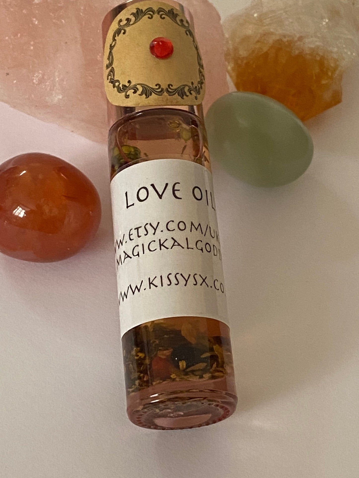 Kissys Love Magickal Oil - Roll on Hoodoo - Wiccan - Magick - With Herbs and Roots. Draws Love and Romance to you. 10ml