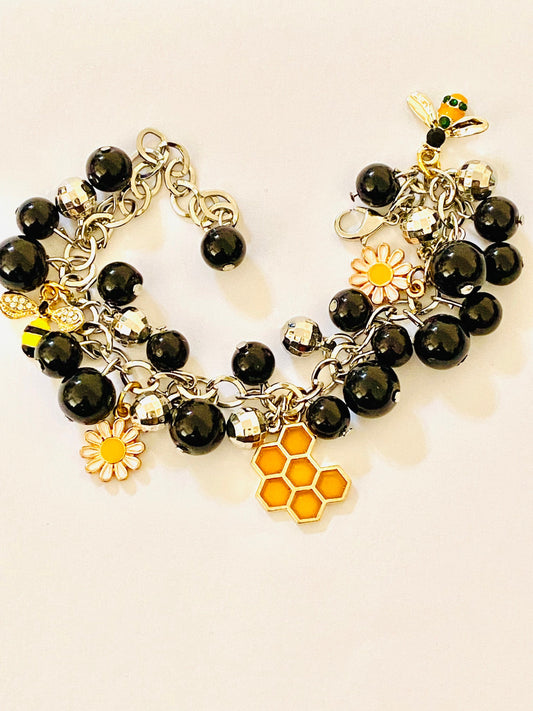 Ladies Women’s Bees & Flowers Charm Silver toned Bracelet. Black Beads.