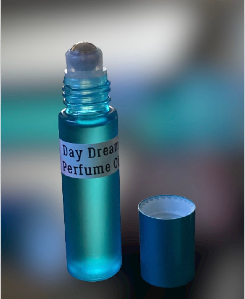 Day Dream Nostalgic roll on perfume in a 10ml bottle. Gift, Beautiful Mandarin, Musk, Vanilla. lily, Bergamot, Scent, Ladies, Men.