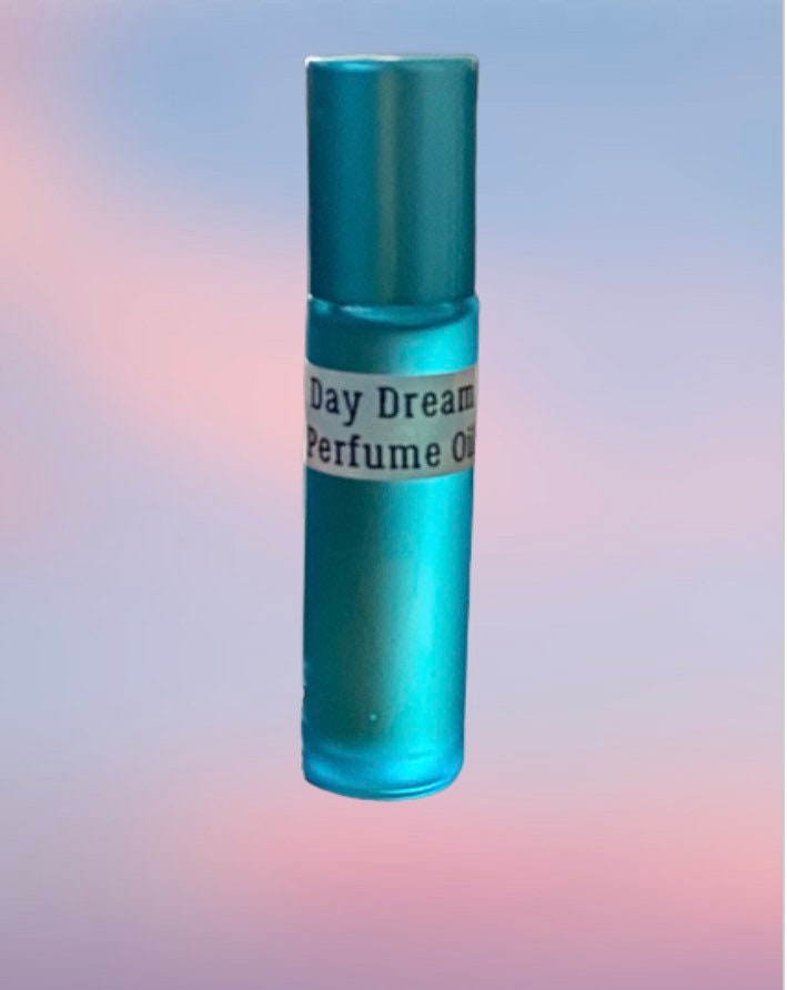 Day Dream Nostalgic roll on perfume in a 10ml bottle. Gift, Beautiful Mandarin, Musk, Vanilla. lily, Bergamot, Scent, Ladies, Men.